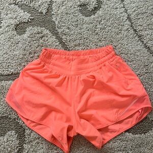 Lululemon sunset orange size 2 low rise 4inch hotty hots